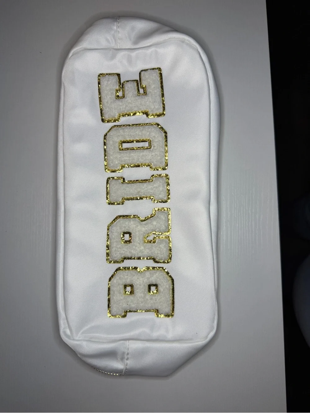 White Cosmetic Pouch with Gold 'BRIDE' Lettering